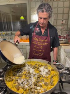 Adding Parmigiano to Risotto Wild Artichoke And Saffron