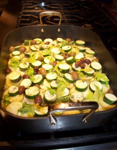 Roasting pan with zucchini and celery